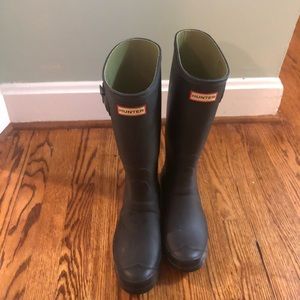 Pre-owned black tall hunter boots.
